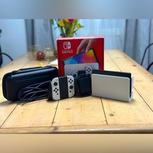 BRAND NEW Nintendo Switch Oled with a brand new carry case